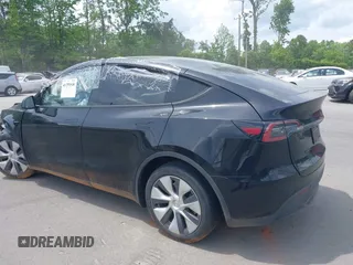 2023 Tesla Model Y Long Range with VIN 7SAYGDEE6PA166514, listed as a IAAI auction lot 41359540 with 16,271 mi miles. Bid and sale history available at carsss.com. Image 3.