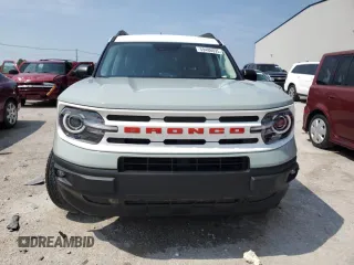 2023 Ford Bronco Sport Heritage z VIN 3FMCR9G68PRD84102, wystawiony jako Copart lot #59486695 z przebiegiem 17 710 mil mil oraz Szkoda całkowita • Salvage title. Historia ofert i sprzedaży dostępna na DreamBid. Obrazek 5.