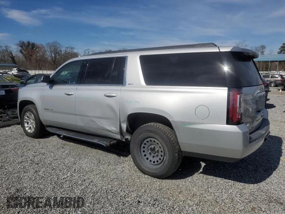 2018 GMC Yukon XL SLT with VIN 1GKS1GKCXJR328985, listed as a Copart auction lot 49485935 with 114,927 mi miles and Salvage Title. Bid and sale history available at carsss.com. Image 2.