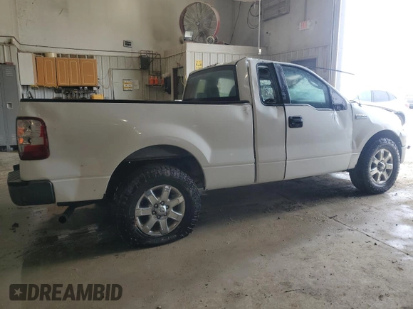 2007 Ford F-150 XL with VIN 1FTRF12237NA02185, listed as a Copart auction lot 52074215 with 204,888 mi miles and Salvage Title. Bid and sale history available at carsss.com. Image 3.