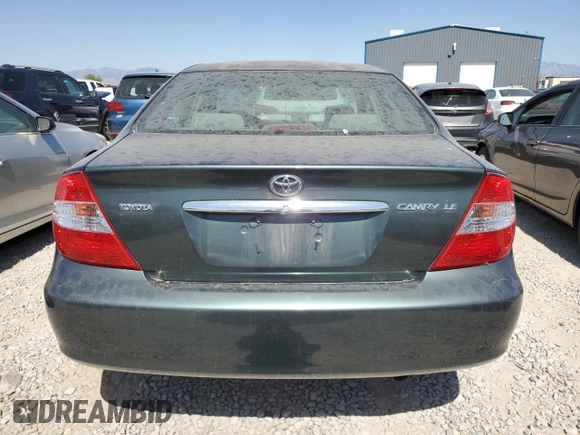 2002 Toyota Camry LE z VIN JTDBE32K120068644, wystawiony jako Copart lot #61168915 z przebiegiem 210 149 mil mil oraz Czysty tytuł • Clean title. Historia ofert i sprzedaży dostępna na DreamBid. Obrazek 6.