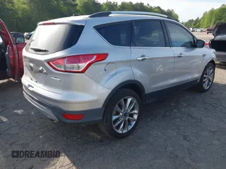 2016 Ford Escape SE with VIN 1FMCU0GX1GUB29903, listed as a IAAI auction lot 42066559 with 156,689 mi miles and . Bid and sale history available at carsss.com. Image 4.