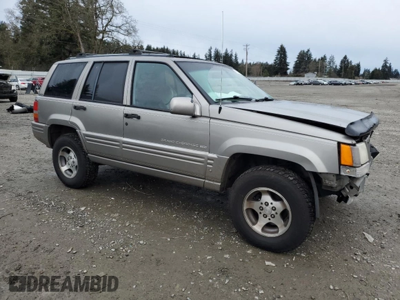 1997 Jeep Grand Cherokee Limited with VIN 1J4GZ78Y4VC693193, listed as a Copart auction lot 46327885 with 235,553 mi miles and Salvage Title. Bid and sale history available at carsss.com. Image 4.