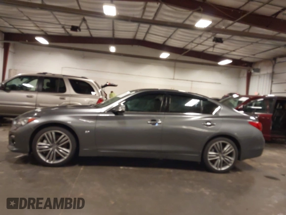 2014 Infiniti Q50 Premium with VIN JN1BV7ARXEM699902, listed as a IAAI auction lot 42135410 with 103,929 mi miles and . Bid and sale history available at DreamBid. Image 15.