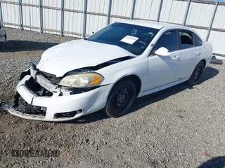 2013 Chevrolet Impala Police with VIN 2G1WD5E34D1265263, listed as a IAAI auction lot 41115415 with 191,679 mi miles. Bid and sale history available at carsss.com. Image 2.