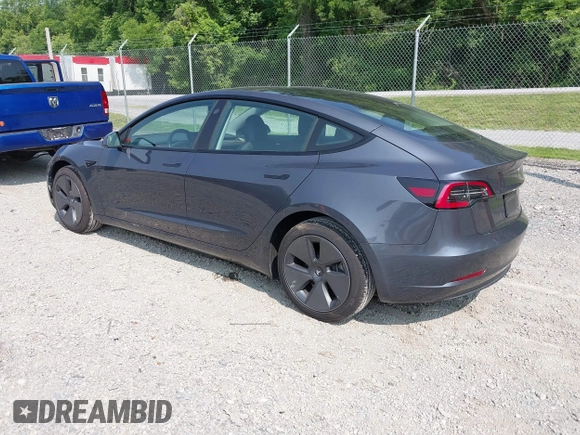 2023 Tesla Model 3 with VIN 5YJ3E1EA2PF566047, listed as a IAAI auction lot 42481008 with 21,143 mi miles and . Bid and sale history available at DreamBid. Image 3.