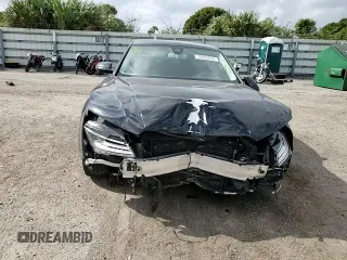 2015 Audi A8 4.0T with VIN WAUJ2AFD5FN013267, listed as a Copart auction lot 39065654 with 64,541 mi miles and . Bid and sale history available at DreamBid. Image 10.