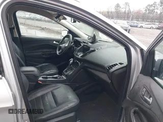2016 Ford Escape Titanium with VIN 1FMCU0JX7GUB25573, listed as a IAAI auction lot 41871980 with 157,525 mi miles. Bid and sale history available at carsss.com. Image 5.