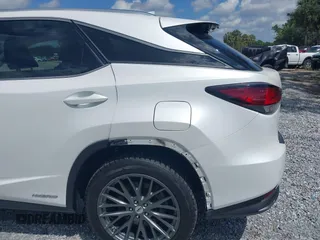 2021 Lexus RX with VIN 2T2JGMDA9MC058061, listed as a IAAI auction lot 42031419 with 40,698 mi miles. Bid and sale history available at carsss.com. Image 22.