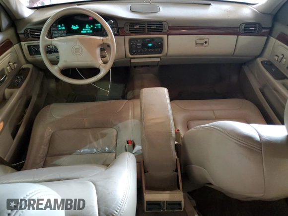 1998 Cadillac DeVille z VIN 1G6KD54Y3WU754718, wystawiony jako Copart lot #60068175 z przebiegiem 64 498 mil mil oraz Czysty tytuł • Clean title. Historia ofert i sprzedaży dostępna na DreamBid. Obrazek 8.