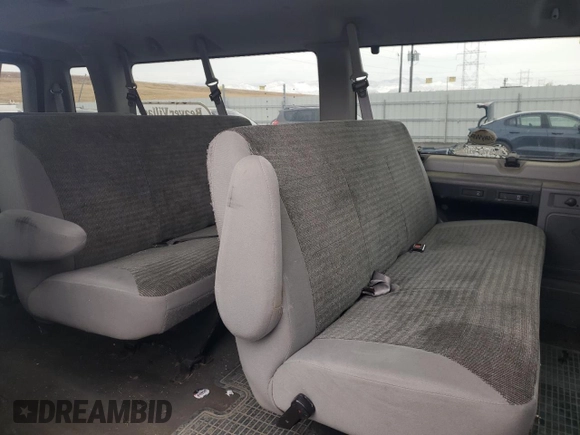 2003 Ford Econoline Passenger XL z VIN 1FBSS31S23HA52924, wystawiony jako Copart lot #77257404 z przebiegiem 170 077 mil mil oraz Nie do naprawy • Non repairable. Historia ofert i sprzedaży dostępna na DreamBid. Obrazek 11.