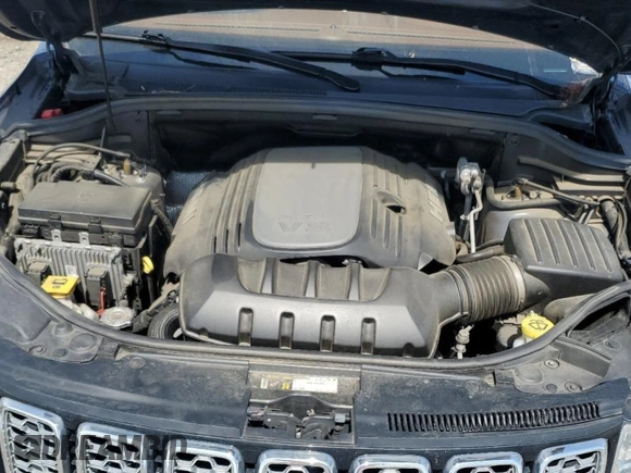 2020 Jeep Grand Cherokee Summit with VIN 1C4RJFJT5LC112392, listed as a Copart auction lot 56391295 with 144,158 mi miles and Salvage title. Bid and sale history available at DreamBid. Image 12.