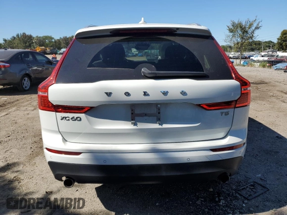 2020 Volvo XC60 Momentum z VIN YV4102DK5L1421574, wystawiony jako Copart lot #75533884 z przebiegiem 60 353 mil mil oraz Szkoda całkowita • Salvage title. Historia ofert i sprzedaży dostępna na DreamBid. Obrazek 6.