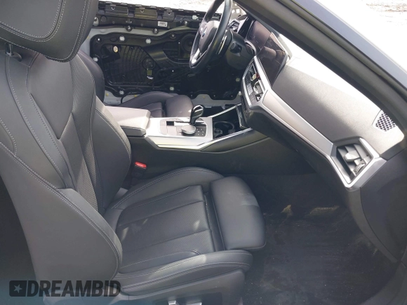 2022 BMW 4 Series 430i xDrive with VIN WBA73AP09NCJ28175, listed as a IAAI auction lot 41486064 with 27,312 mi miles and . Bid and sale history available at DreamBid. Image 5.