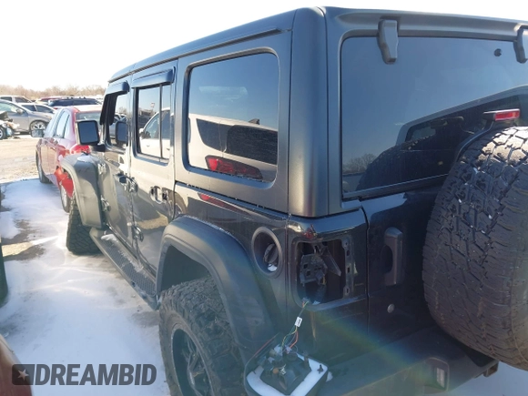2018 Jeep Wrangler Unlimited Sport z VIN 1C4HJXDN9JW231587, wystawiony jako IAAI lot #41564880 z przebiegiem 129 003 mil mil oraz . Historia ofert i sprzedaży dostępna na DreamBid. Obrazek 14.