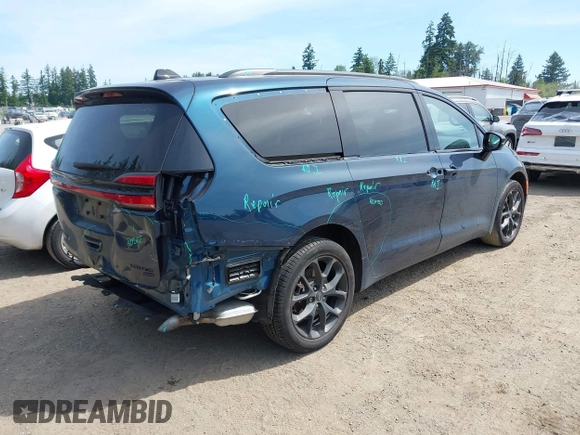 2023 Chrysler Pacifica Limited with VIN 2C4RC3GGXPR555282, listed as a IAAI auction lot 42452848 with 18,373 mi miles and . Bid and sale history available at DreamBid. Image 4.