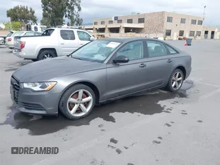 2013 Audi A6 2.0T Premium with VIN WAUCFAFC3DN043093, listed as a IAAI auction lot 42043576 with 136,592 mi miles. Bid and sale history available at carsss.com. Image 2.