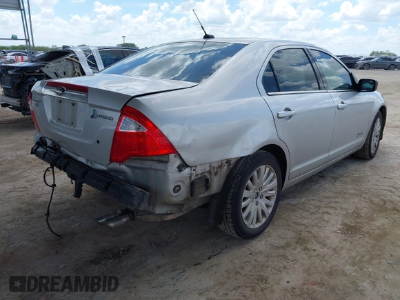2012 Ford Fusion Hybrid с VIN 3FADP0L36CR426322, выставлен на аукционе IAAI как лот 42592635 с пробегом 151 941 миль миль и . История ставок и продаж доступна на DreamBid. Изображение 4.