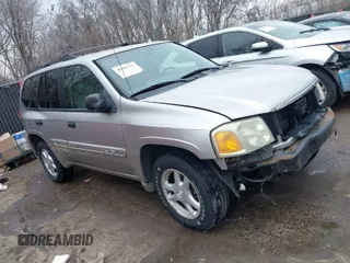 2005 GMC Envoy SLE with VIN 1GKDT13S552332088, listed as a IAAI auction lot 41699178 with 196,869 mi miles. Bid and sale history available at carsss.com. Image 1.