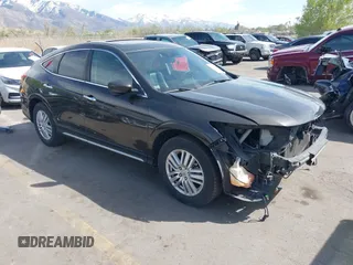 2013 Honda Crosstour EX-L z VIN 5J6TF3H56DL000595, wystawiony jako IAAI lot #42029331 z przebiegiem 188 688 mil mil oraz . Historia ofert i sprzedaży dostępna na DreamBid. Obrazek 1.