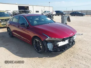 2023 Kia K5 GT-Line z VIN 5XXG64J27PG227330, wystawiony jako IAAI lot #42028149 z przebiegiem 21 543 mil mil oraz . Historia ofert i sprzedaży dostępna na DreamBid. Obrazek 1.