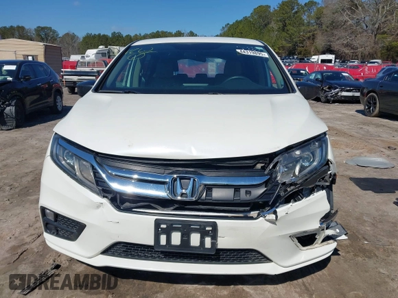 2019 Honda Odyssey LX with VIN 5FNRL6H23KB049236, listed as a IAAI auction lot 41633339 with 96,000 mi miles and . Bid and sale history available at DreamBid. Image 12.