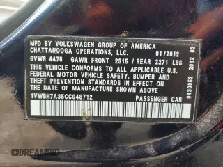 2012 Volkswagen Passat SE z VIN 1VWBH7A35CC048712, wystawiony jako Copart lot #58867305 z przebiegiem 162 954 mil mil oraz Czysty tytuł • Clean title. Historia ofert i sprzedaży dostępna na DreamBid. Obrazek 12.