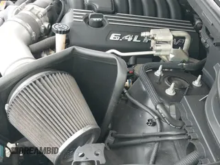 2012 Jeep Grand Cherokee SRT-8 z VIN 1C4RJFDJ5CC125878, wystawiony jako IAAI lot #42972918 z przebiegiem 109 967 mil mil oraz . Historia ofert i sprzedaży dostępna na DreamBid. Obrazek 19.