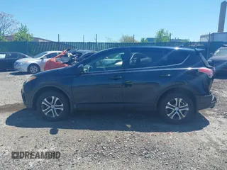 2017 Toyota RAV4 LE with VIN JTMBFREV8HJ168975, listed as a IAAI auction lot 42139354 with 91,394 mi miles and . Bid and sale history available at DreamBid. Image 14.