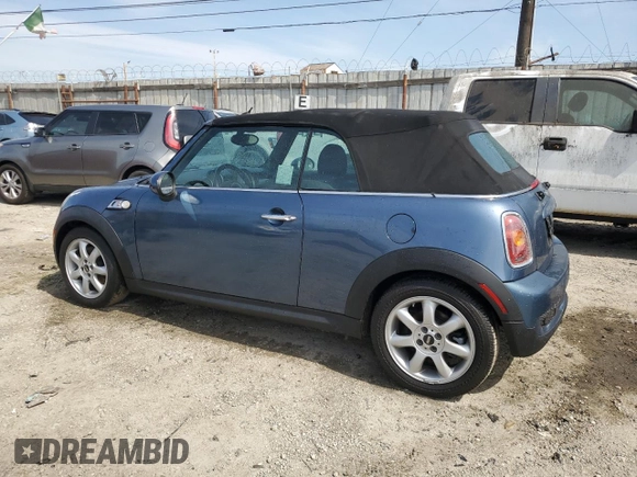 2010 MINI Convertible S with VIN WMWMS3C5XATY51076, listed as a Copart auction lot 48532735 with 104,901 mi miles and Clean title. Bid and sale history available at DreamBid. Image 2.