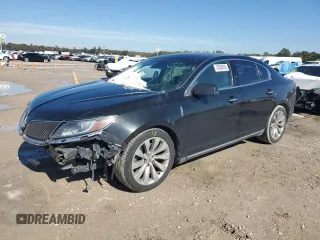 2014 Lincoln MKS z VIN 1LNHL9DK3EG606655, wystawiony jako Copart lot #42008655 z przebiegiem 100 886 mil mil oraz Szkoda całkowita • Salvage title. Historia ofert i sprzedaży dostępna na DreamBid. Obrazek 1.