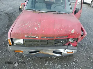 1986 Nissan Hardbody z VIN 1N6HD16S3GC426938, wystawiony jako Copart lot #79319484 z przebiegiem 186 368 mil mil oraz Szkody całkowita. Historia ofert i sprzedaży dostępna na DreamBid. Obrazek 12.