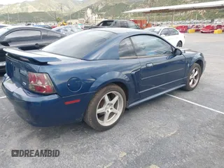 2003 Ford Mustang Standard with VIN 1FAFP40463F447312, listed as a IAAI auction lot 39814508 with 227,025 mi miles. Bid and sale history available at carsss.com. Image 4.