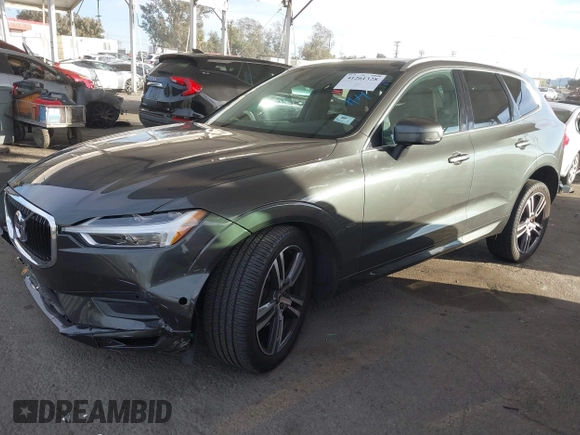 2019 Volvo XC60 Momentum with VIN LYV102RKXKB196748, listed as a IAAI auction lot 41261328 with 74,925 mi miles and . Bid and sale history available at DreamBid. Image 2.