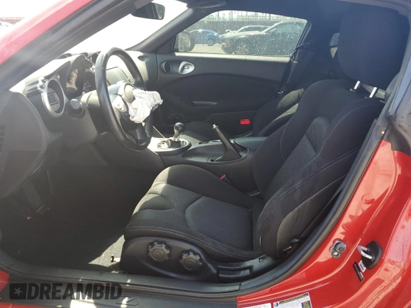 2009 Nissan 370Z Touring with VIN JN1AZ44EX9M402480, listed as a Copart auction lot 74838314 with 0 mi miles and Salvage Title. Bid and sale history available at carsss.com. Image 7.
