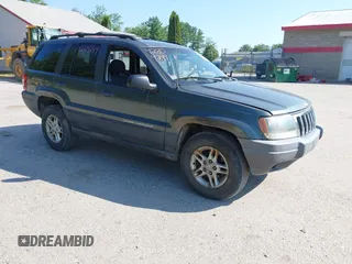 2004 Jeep Grand Cherokee Laredo z VIN 1J4GW48S24C292503, wystawiony jako IAAI lot #42809249 z przebiegiem 188 063 mil mil oraz . Historia ofert i sprzedaży dostępna na DreamBid. Obrazek 1.