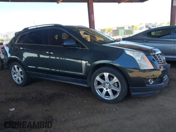 2014 Cadillac SRX Premium Collection z VIN 3GYFNDE31ES653114, wystawiony jako IAAI lot #42107858 z przebiegiem 125 192 mil mil oraz . Historia ofert i sprzedaży dostępna na DreamBid. Obrazek 1.