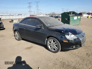 2009 Volkswagen Eos Lux с VIN WVWFA71F99V011940, выставлен на аукционе Copart как лот 48558885 с пробегом 75 242 миль миль и Списание • Salvage title. История ставок и продаж доступна на DreamBid. Изображение 4.