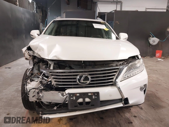 2013 Lexus RX 350 z VIN 2T2BK1BA1DC221743, wystawiony jako IAAI lot #42336253 z przebiegiem 62 754 mil mil oraz . Historia ofert i sprzedaży dostępna na DreamBid. Obrazek 12.