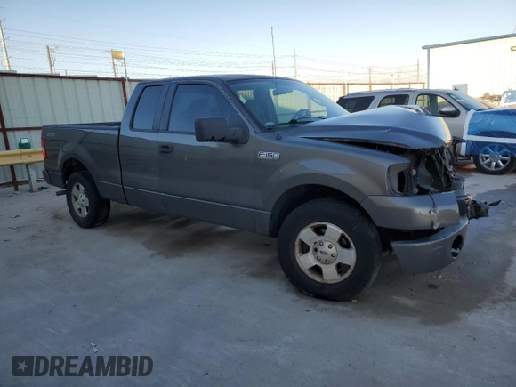 2007 Ford F-150 STX with VIN 1FTRX12W97KD12990, listed as a Copart auction lot 46939335 with 216,759 mi miles and Salvage Title. Bid and sale history available at DreamBid. Image 4.