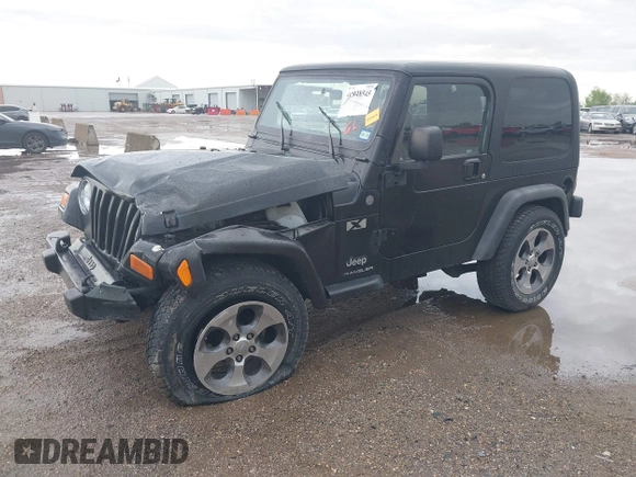 2004 Jeep Wrangler X with VIN 1J4FA39S34P753865, listed as a IAAI auction lot 41948545 with 198,169 mi miles. Bid and sale history available at carsss.com. Image 17.