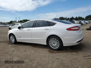 2014 Ford Fusion SE Hybrid with VIN 3FA6P0LU1ER308327, listed as a Copart auction lot 58127315 with 189,069 mi miles and Salvage title. Bid and sale history available at DreamBid. Image 2.