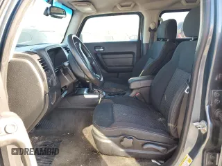 2006 Hummer H3 with VIN 5GTDN136X68212254, listed as a Copart auction lot 77040314 with 129,690 mi miles and Clean Title. Bid and sale history available at carsss.com. Image 7.