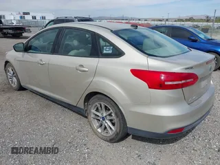 2018 Ford Focus SE with VIN 1FADP3FE7JL230870, listed as a IAAI auction lot 42021541 with 84,000 mi miles. Bid and sale history available at carsss.com. Image 3.