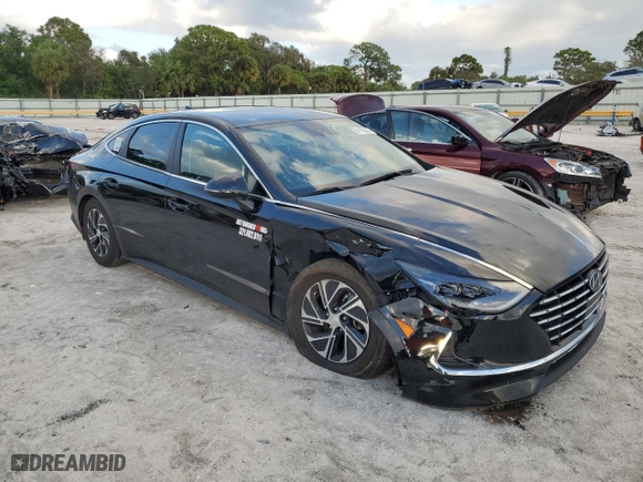 2023 Hyundai Sonata Hybrid Blue with VIN KMHL24JJ1PA060455, listed as a Copart auction lot 87152374 with 42,058 mi miles and Non Repairable. Bid and sale history available at carsss.com. Image 4.