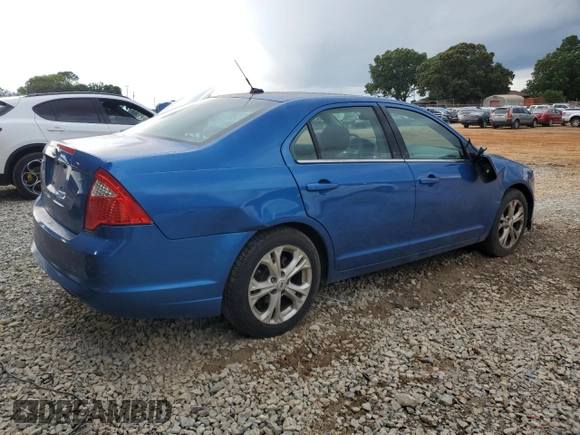 2012 Ford Fusion SE with VIN 3FAHP0HA7CR242547, listed as a Copart auction lot 60599355 with 190,209 mi miles and Salvage title. Bid and sale history available at DreamBid. Image 3.