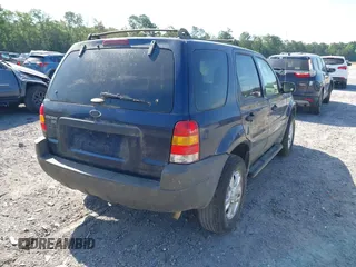 2004 Ford Escape XLT with VIN 1FMYU03114DA07741, listed as a IAAI auction lot 42332830 with 210,556 mi miles and . Bid and sale history available at DreamBid. Image 4.