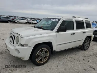 2008 Jeep Patriot Limited with VIN 1J8FT48W58D649307, listed as a Copart auction lot 84977034 with 211,629 mi miles and Clean Title. Bid and sale history available at DreamBid. Image 1.