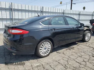 2016 Ford Fusion SE Hybrid with VIN 3FA6P0LU8GR177030, listed as a Copart auction lot 60332805 with 177,885 mi miles and Salvage title. Bid and sale history available at DreamBid. Image 3.