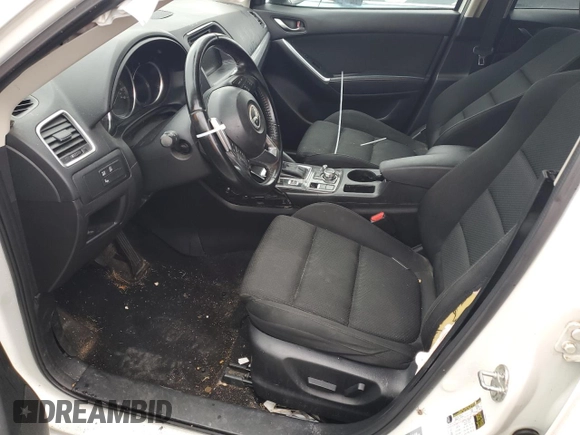2016 Mazda CX-5 Touring with VIN JM3KE2CY6G0896040, listed as a Copart auction lot 78399684 with 98,639 mi miles and Salvage Title. Bid and sale history available at DreamBid. Image 7.